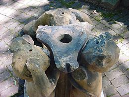 Image 4: Three holes in Putti heads. Break from above.