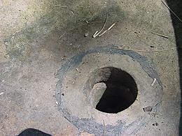 Image 11:  Caulk residue at central hole in bowl.